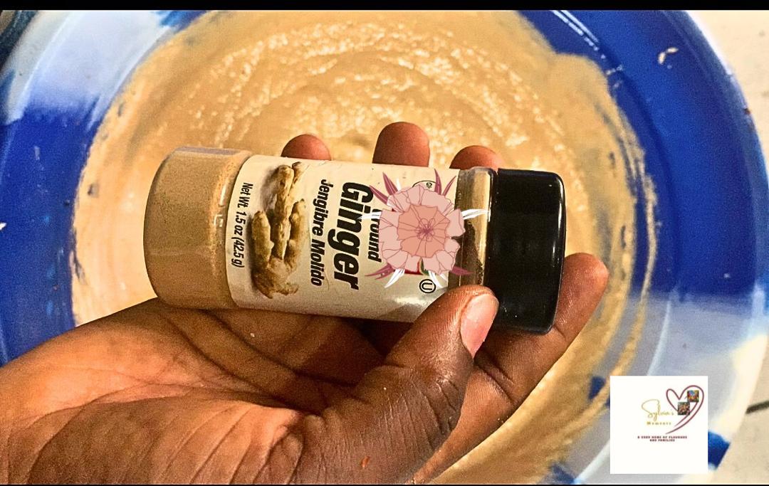  Adding-Ginger-to-Moi-Moi-Mixture.j