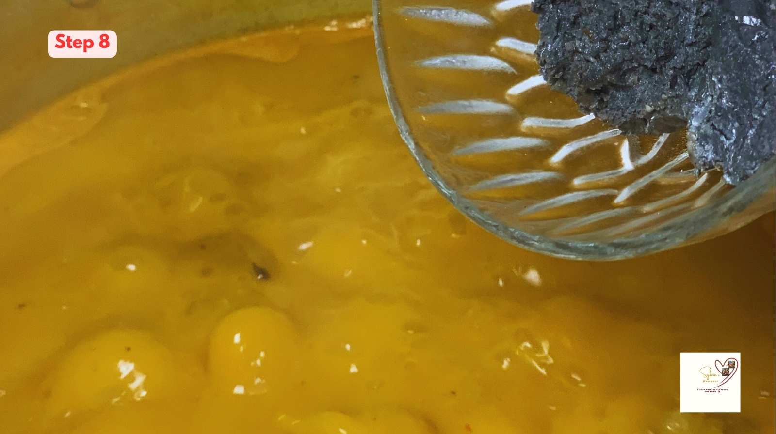 Adding ogiri Igbo to soup