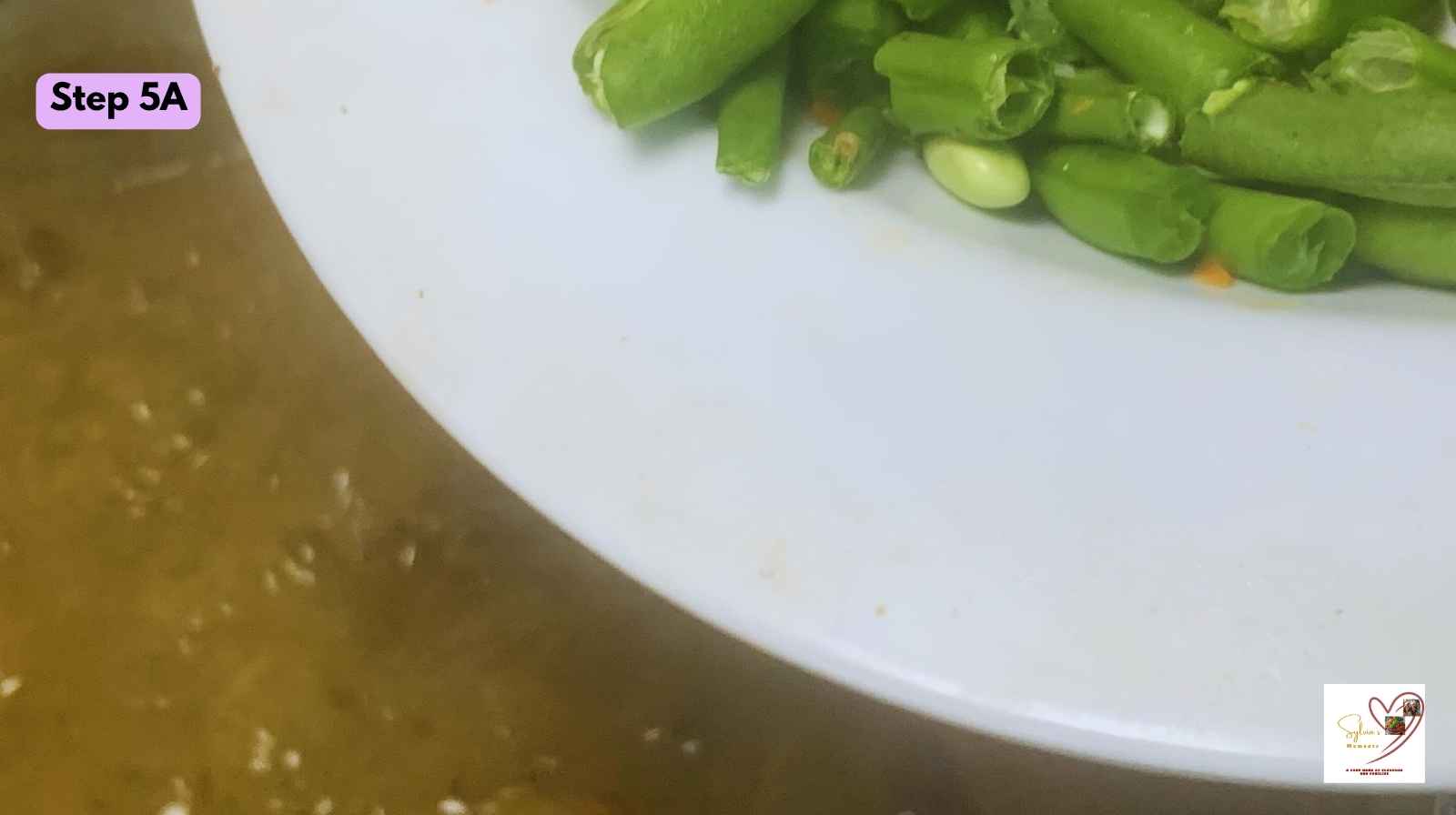 Adding-Green-peas-to-easy-chicken-curry-recipe.