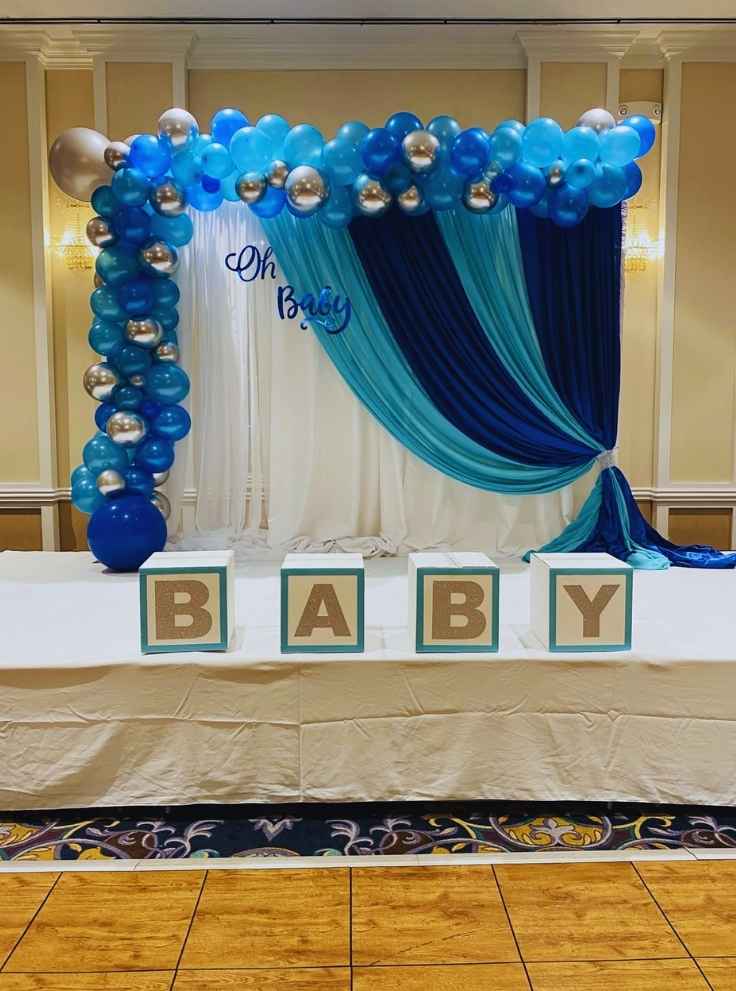 BALOON-AND-FABRIC-COMBO-BACKDRO-31-Creative-Baby-shower-Backdrop-Ideas-(-Gender‑Neutral-&-Stunning-)