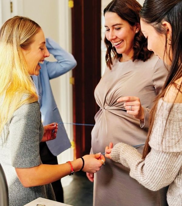 Measure-the-baby-bump-baby-shower-game-25-Funny-Baby-Shower-Games-for-Adults-That-Guests-Will-Actually-Enjoy