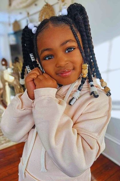 Middle-Part-Pigtails-25-school-friendly-loc-styles-for-kids-easy-protective