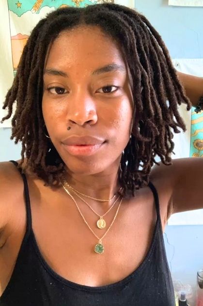 Middle-Part-Sleek-Locs-30-Show-Stopping-Birthday-Loc-Styles-You-Will-Love-To-Copy