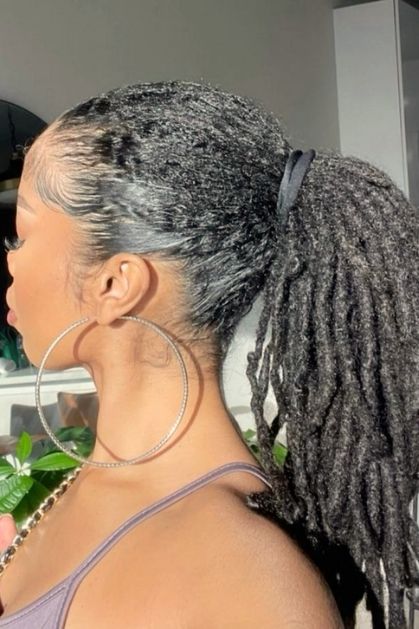 Sleek-Pulled-Back-Loc-Style